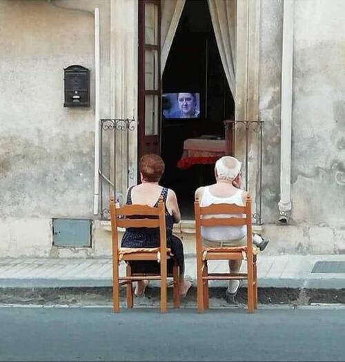 An Old Couple Happily Waiting